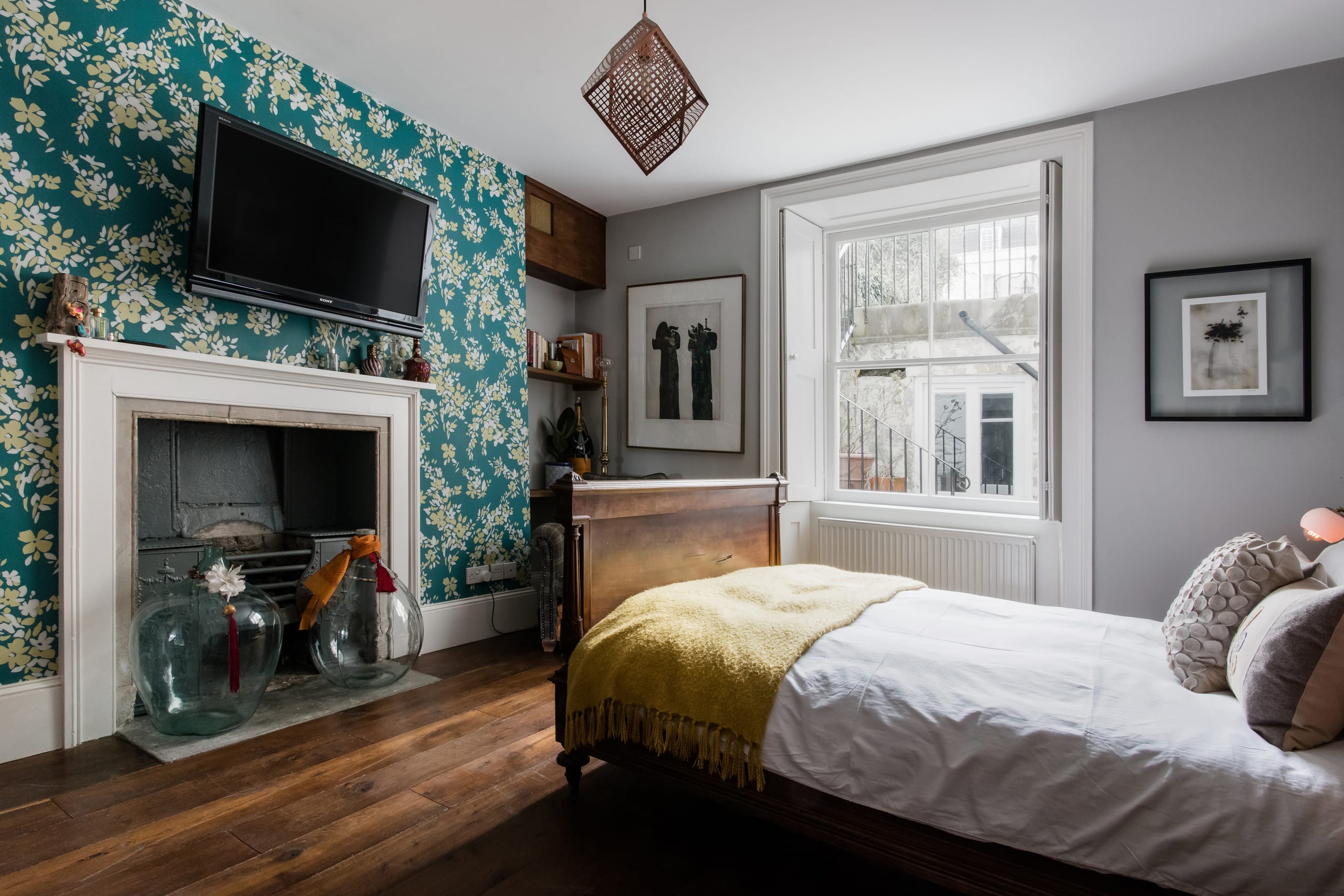 An antique double bed in the quiet main bedroom